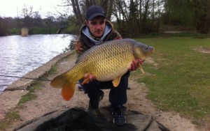 A view of a large carp caught by an angler at Earlswood Common Lower Lake fishing venue