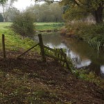 An autumn view of the River Mole fishing venue at Kinnersley Manor.