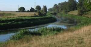 A view of the Iden Lock to Appledore stretch of the Royal Military Canal on a sunny day